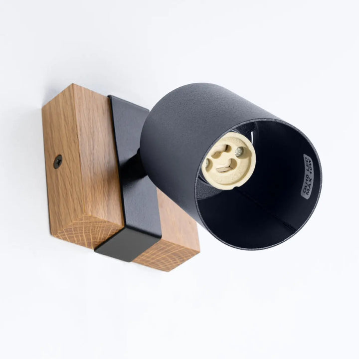 Applique murale lampe directionnelle fager 1 noir avec boîtier moderne en métal noir et base en bois naturel