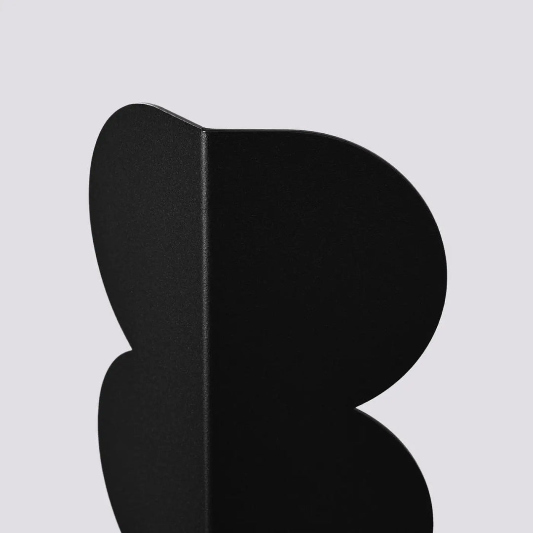 Applique murale biscuit noir en métal mat forme ondulée caractéristique compose d’une lampe suspendue luminaires biscuit allient élégance et modernité
