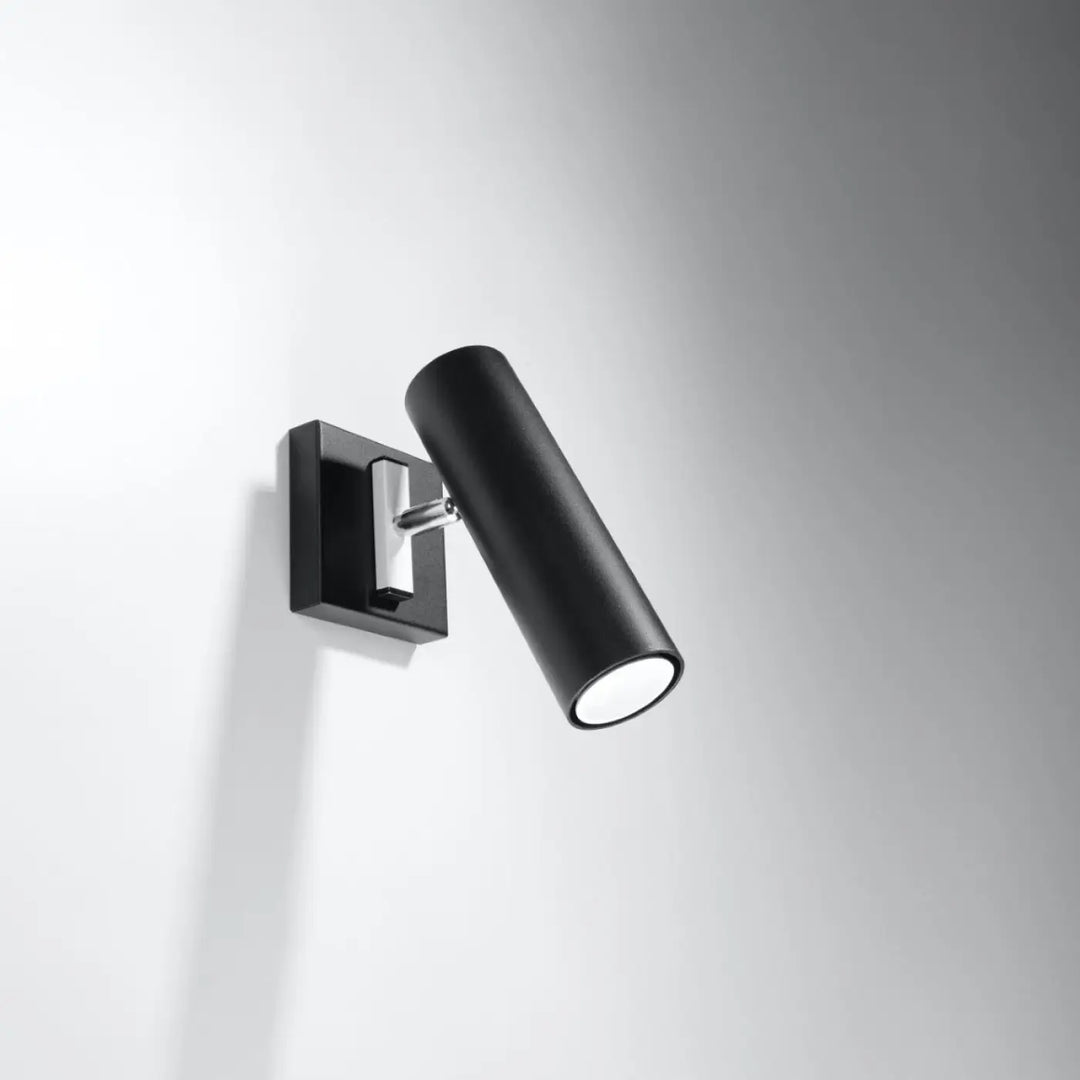Applique murale minimaliste noire avec accent métallique de la série direzione pour un éclairage élégant mural