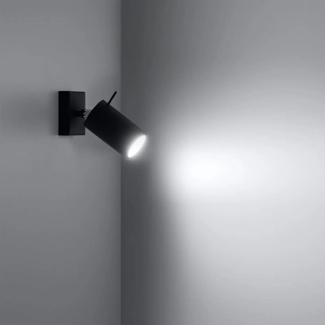 Applique murale noire ring avec bras mobile et tête cylindrique pour une totale liberté d aménagement