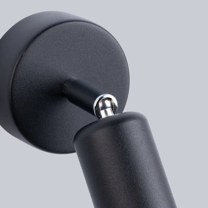 Applique murale fornes 1 noir avec spot ajustable cylindrique mat et articulation chrome de la gamme fornes