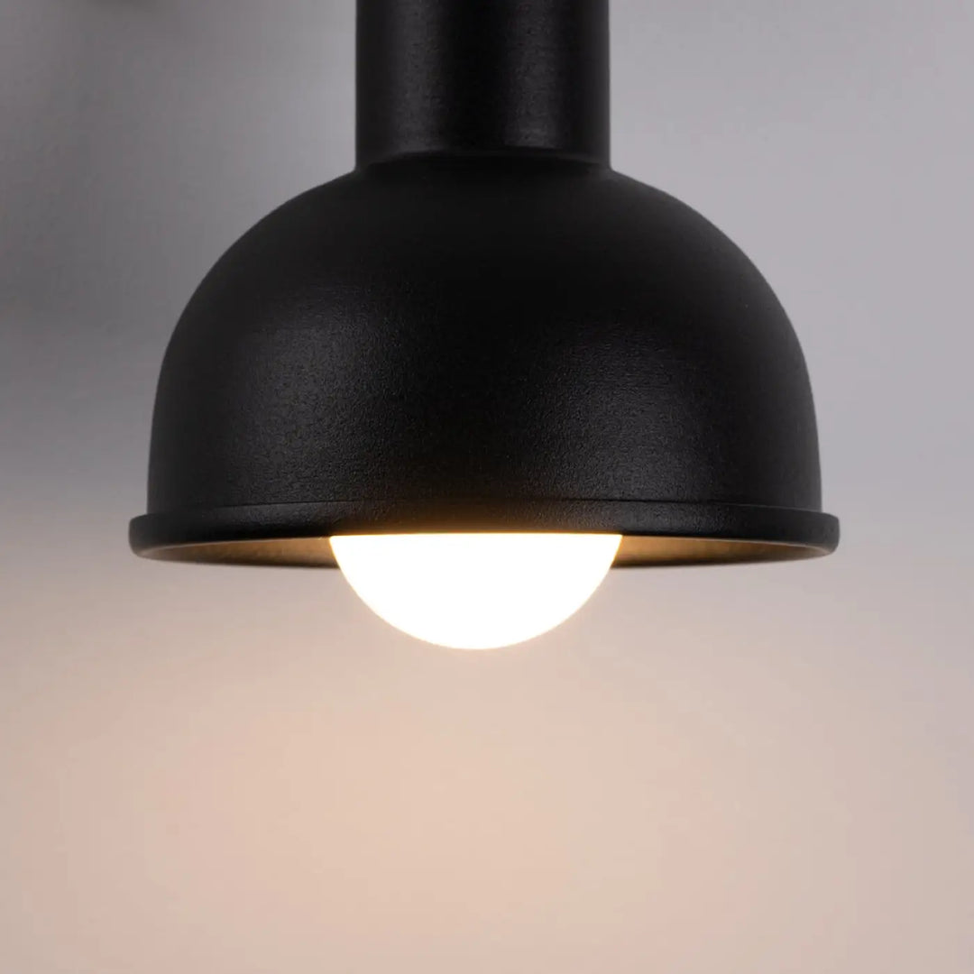 Lampe elba applique murale noir en finition mate industrielle avec un éclat chaleureux minimalisme combiné à des éléments subtils