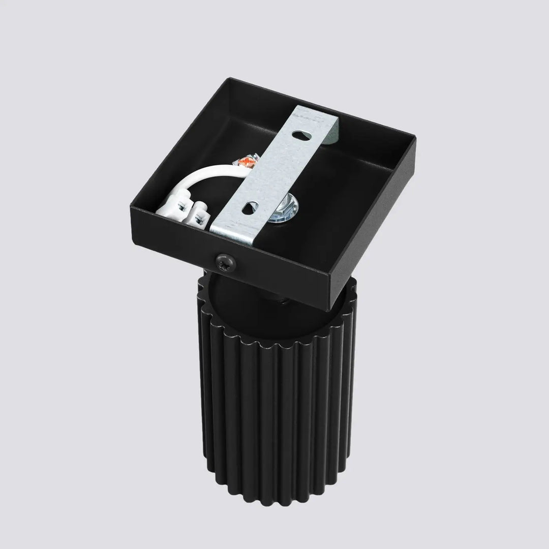Aplollier karbon allie design minimaliste noir avec base cylindrique rainurée et ampoules gu10 interchangeables visible wiring