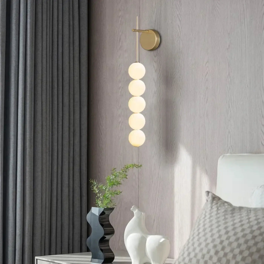 Applique murale originale dorée avec effet solaire doux