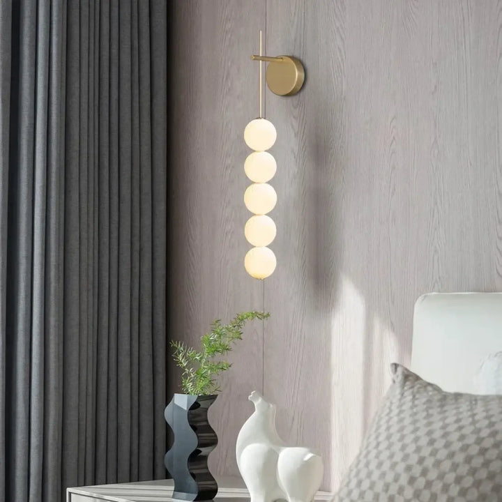Applique murale originale dorée avec effet solaire doux