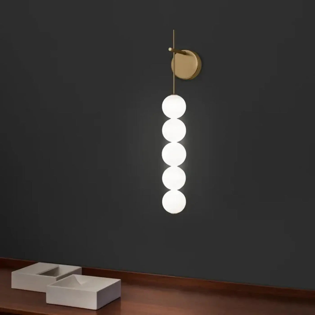 Applique murale originale dorée avec effet solaire doux