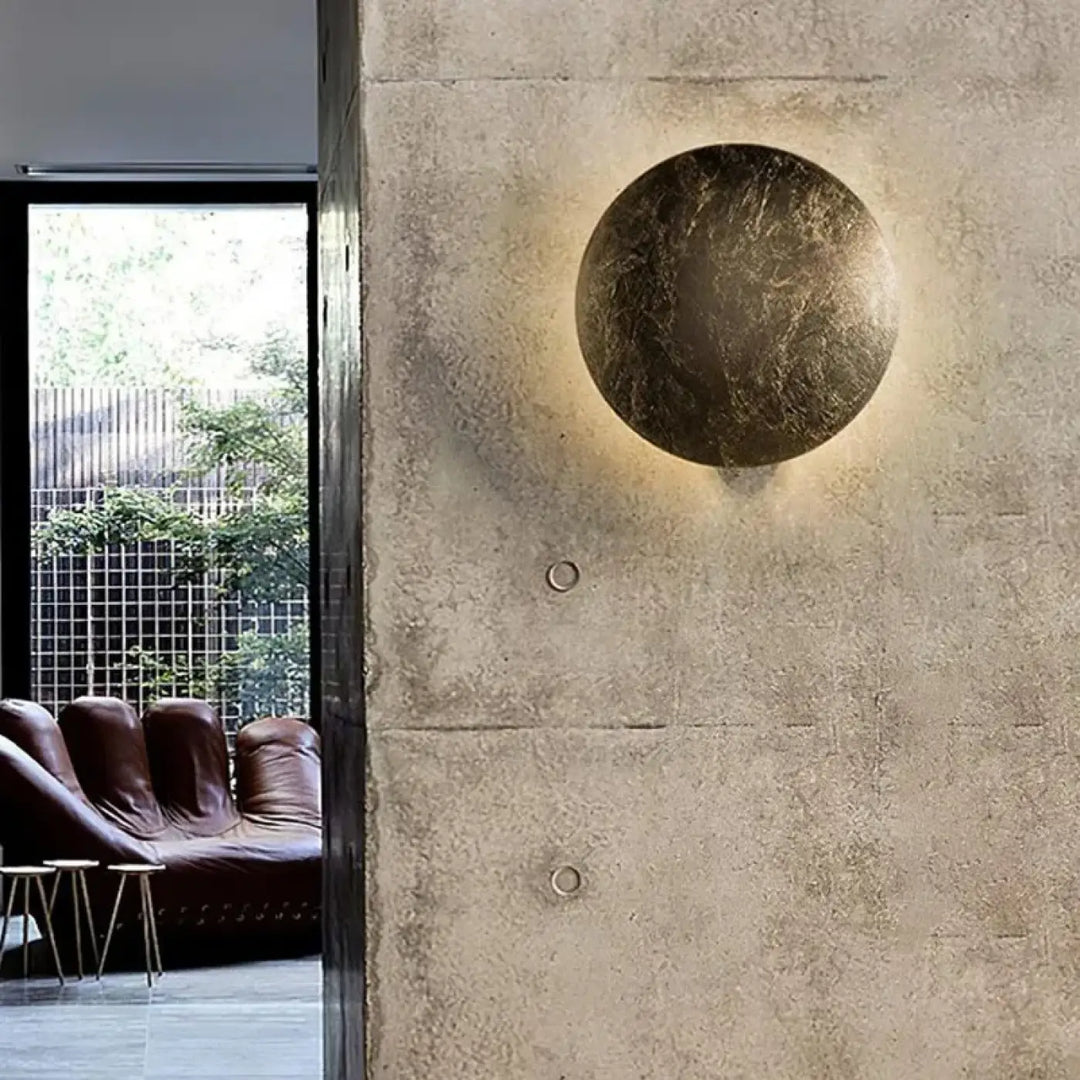 Applique murale ronde LED dorée design effet lune