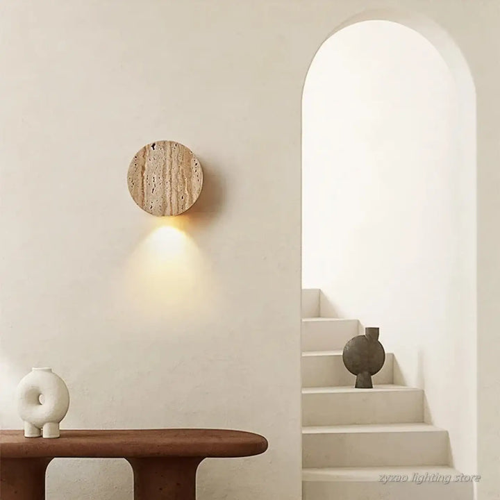 Applique murale ronde LED à l'effet pierre volcanique beige

