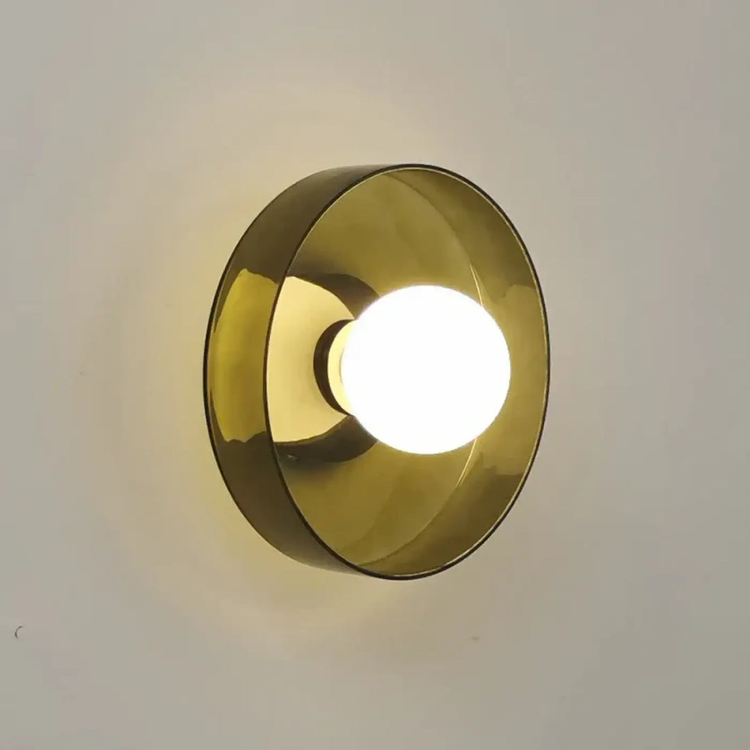 Applique murale ronde en verre avec une boule blanche

