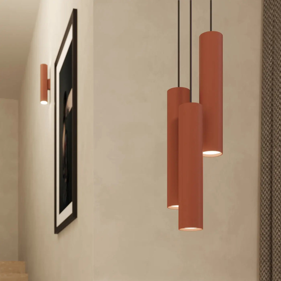 Lampe à suspension lagos 2 en terre cuite cylindrique rouge ocre avec design moderne et cordons noirs élégants