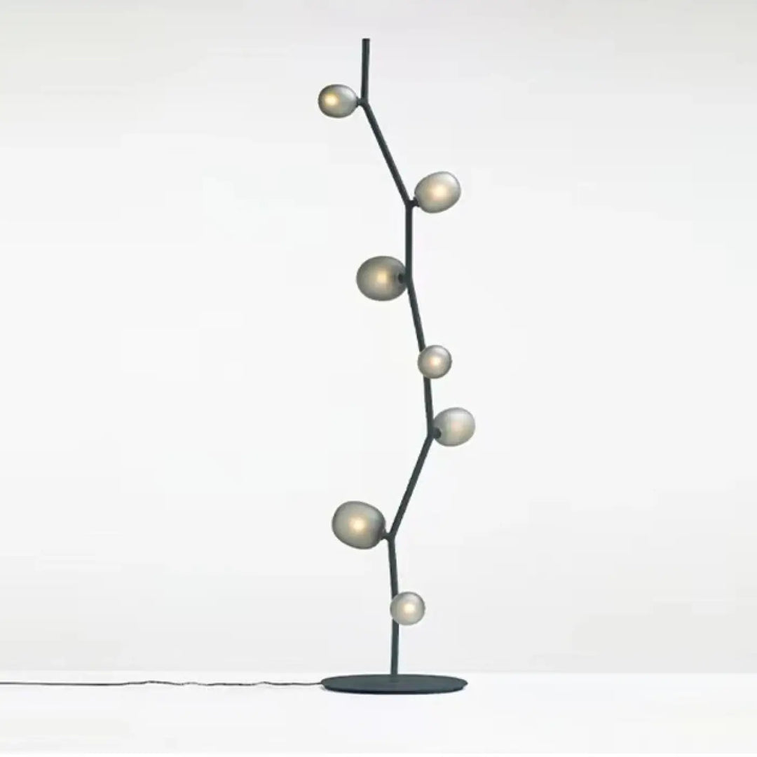 Lampadaire décoratif moderne en métal et globes en verre élégant