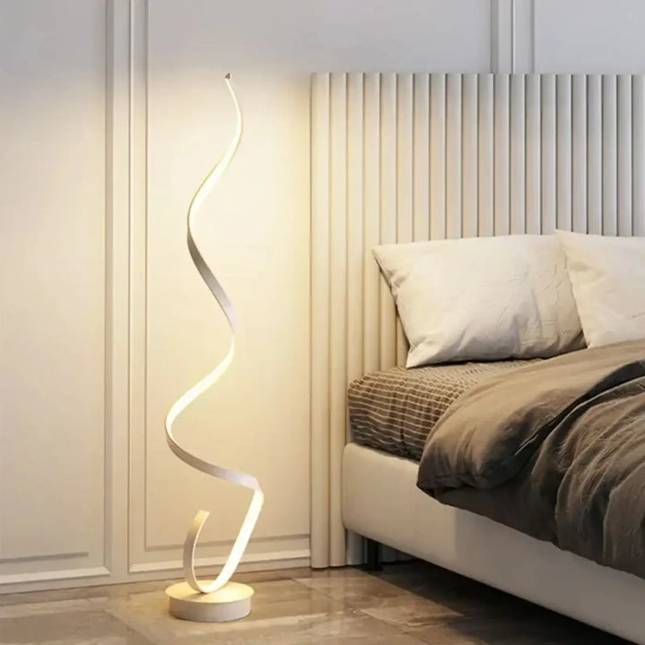Lampadaire led spiry avec design ondulé blanc et éclairage ambiant chaud pour intérieur moderne