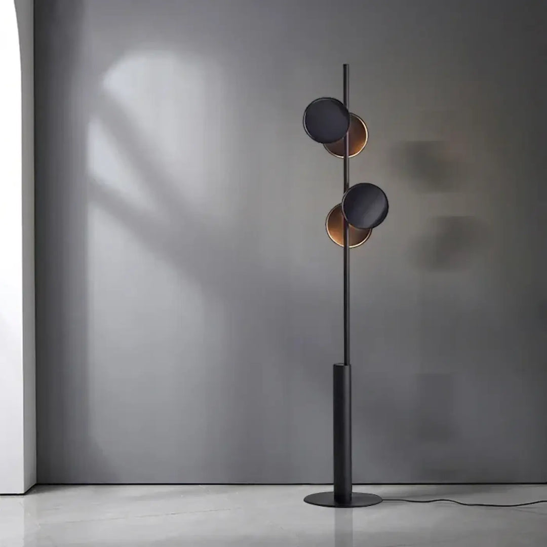 Lampadaire moderne duolia avec double éclairage à silhouette graphique en métal noir et abat-jours circulaires noir mat et cuivre