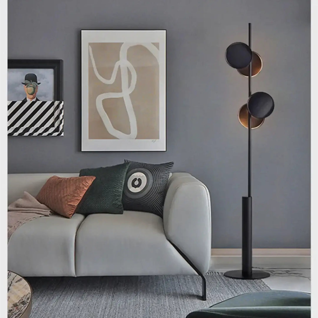 Lampadaire moderne duolia avec double éclairage noir et or et silhouette graphique en métal élancé