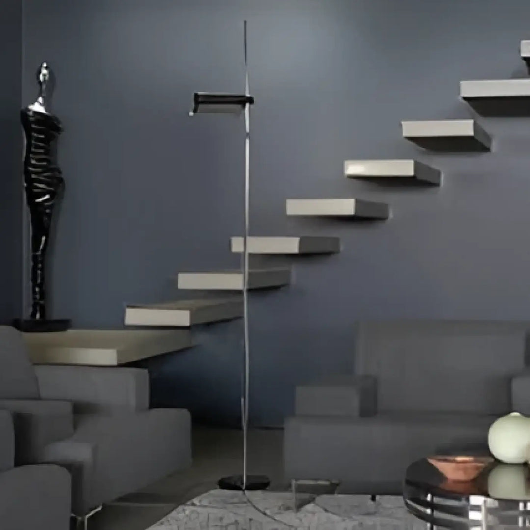 Lampadaire design axys avec tête lumineuse orientable, structure métal noir minimaliste et abat-jour cylindrique élégant