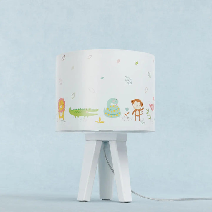 Lampe de table blanc avec abat-jour cylindrique aux adorables animaux exotiques colorés comme lion crocodile et singe