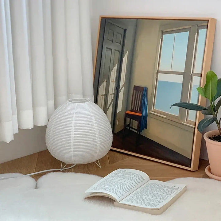 Lampe de chevet japonaise en papier blanc avec design minimaliste sphérique à lumière douce et pieds métalliques fins