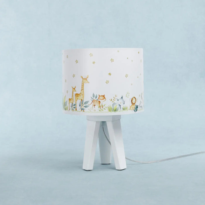 Lampe de table chevet enfant en bois jaune blanc avec abat-jour cylindrique motifs animaliers safari et étoiles dorées