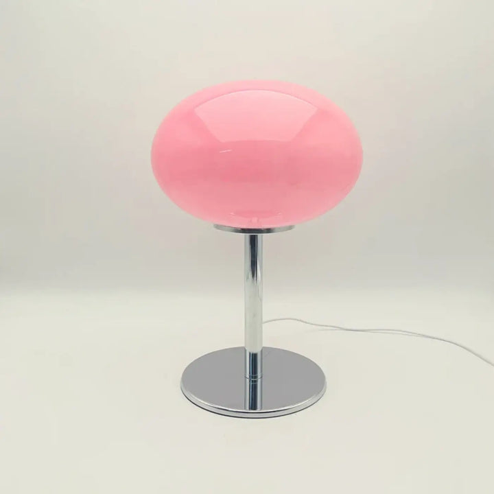 Lampe de chevet bonia avec lumière douce, sphère en verre rose glossy et base chrome pour décoration intérieure minimaliste