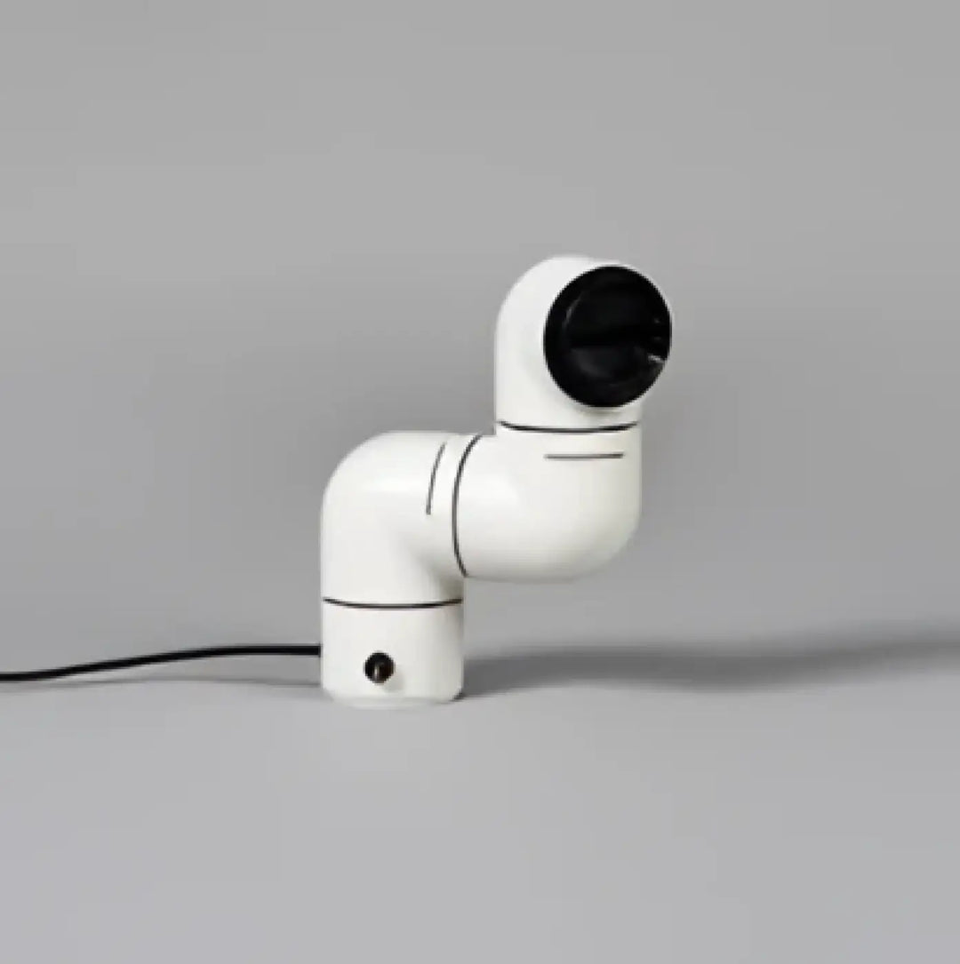 Lampe de chevet alana avec bras robotique blanc et articulation sphérique noire au design chevet rétro futuriste