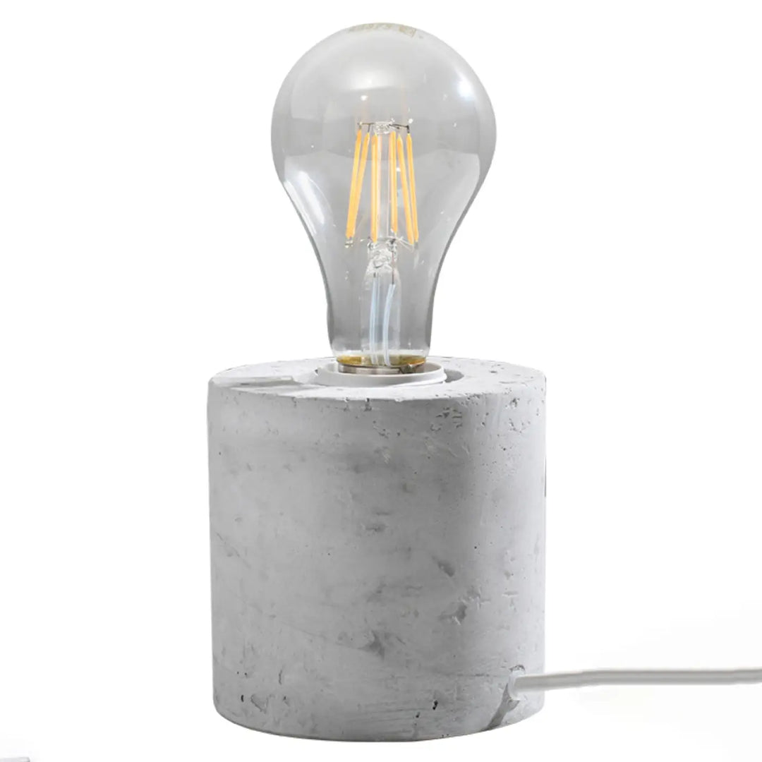 Lampe à poser béton salgado avec ampoule led filament claire pour un bureau salgado style loft minimaliste