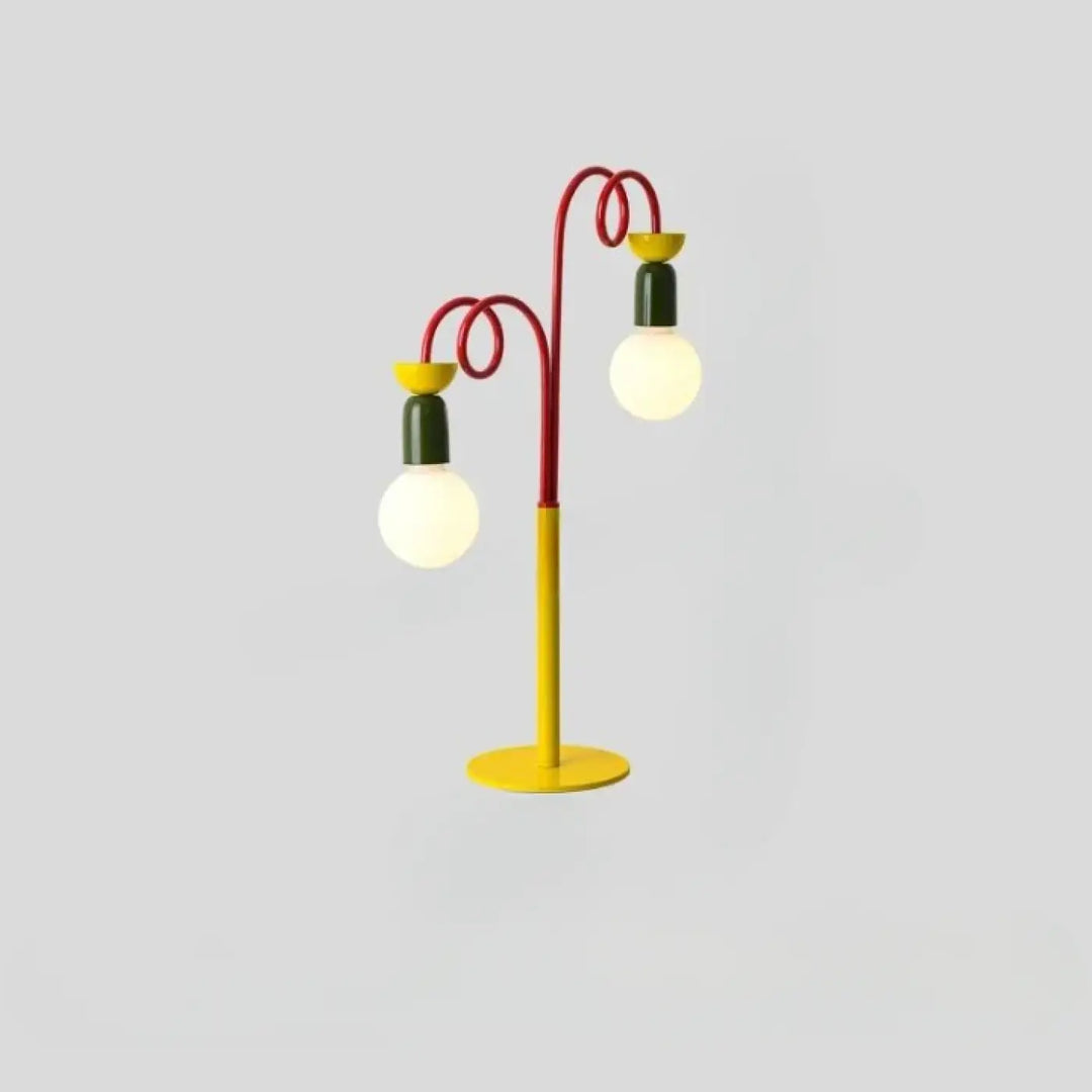 Lampe de table ziggy en métal jaune, rouge et vert avec deux bras courbés et détails rétro, table contemporaine élégante