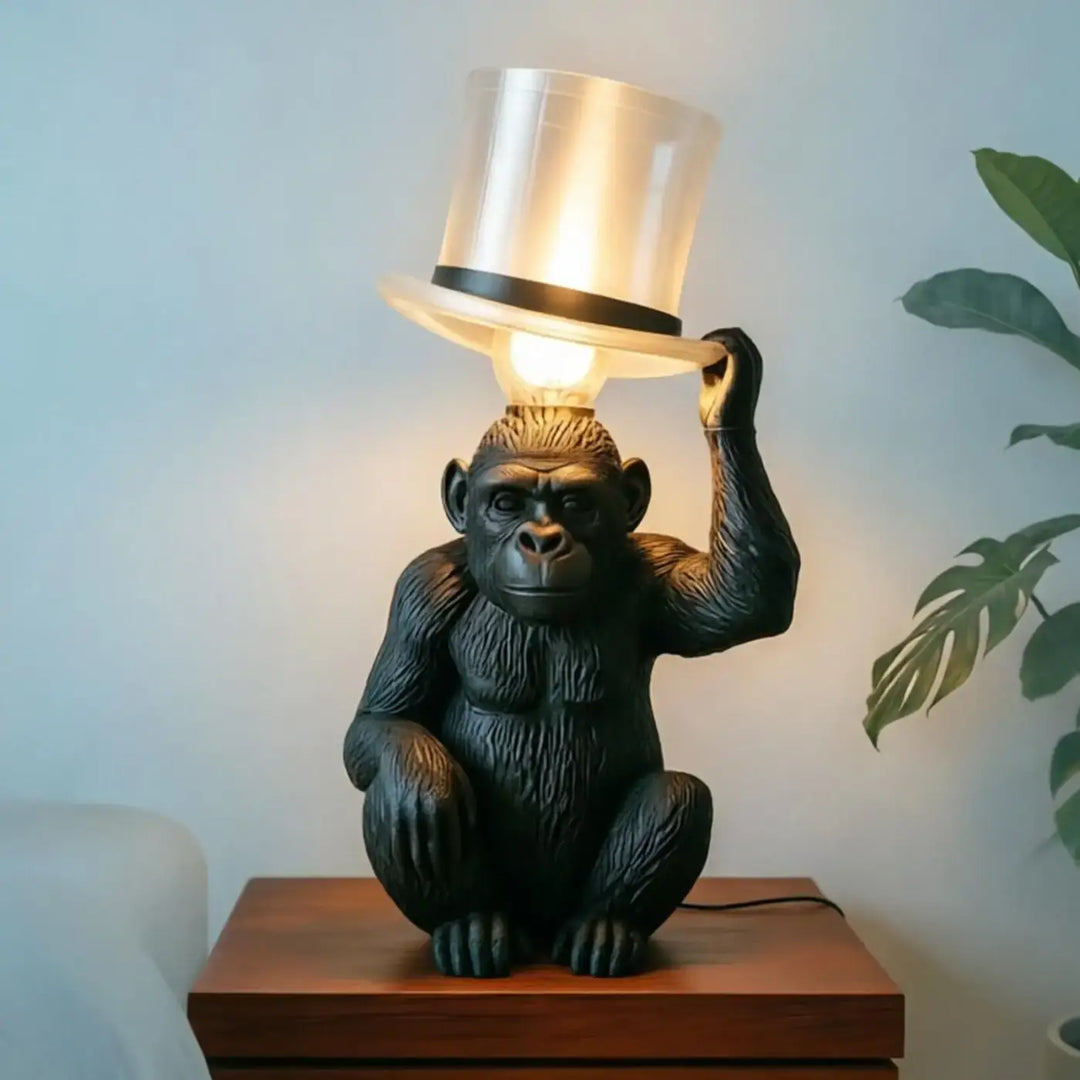 Lampe de table décorative gorille noire avec chapeau transparent translucide par lumingo