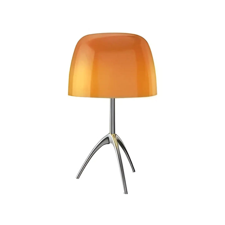 Lampe de table lakko avec abat-jour translucide orange et pied trépied chromé élégant