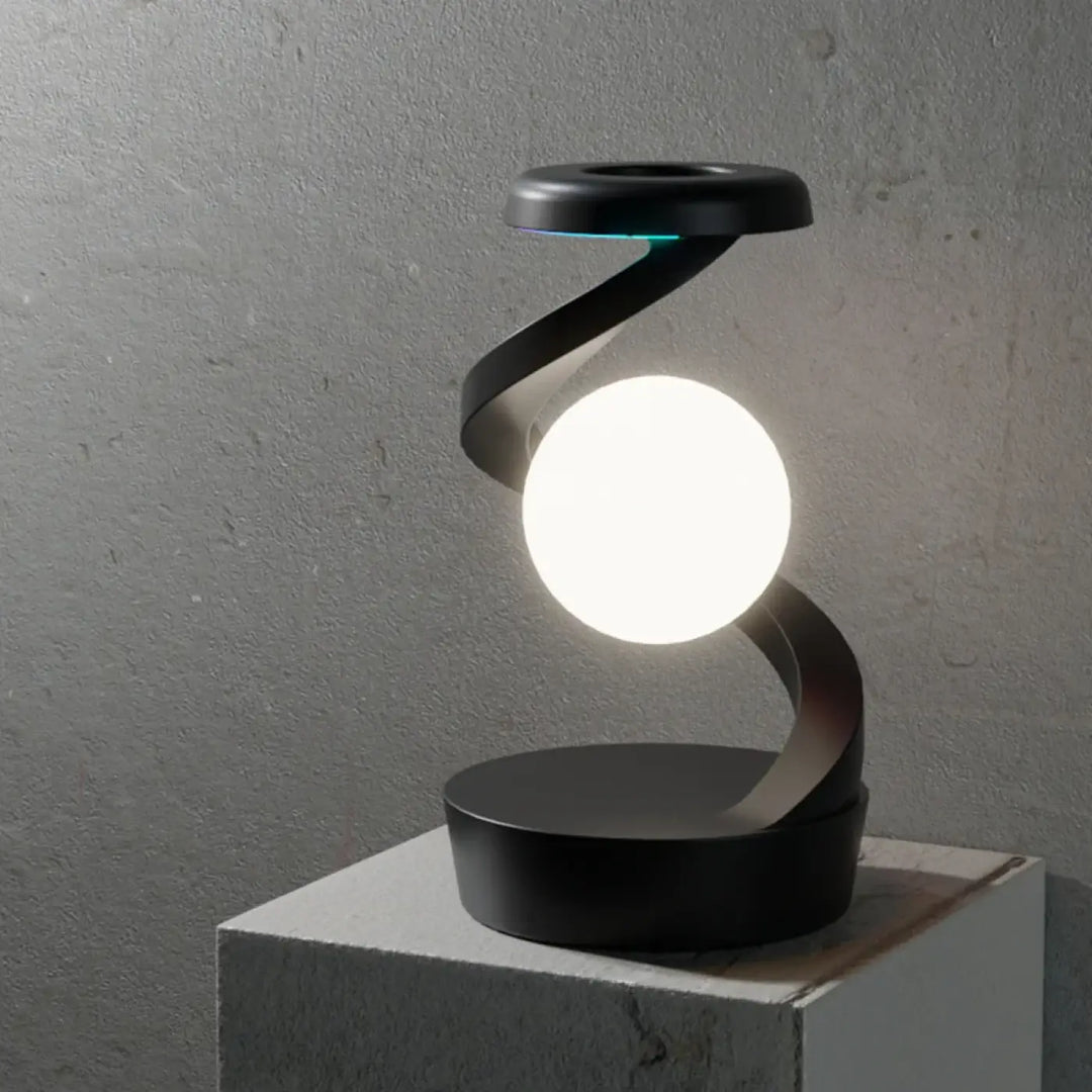 Lampe de table sylora avec design aux formes ondulées noire et ampoule sphérique blanche lumineuse