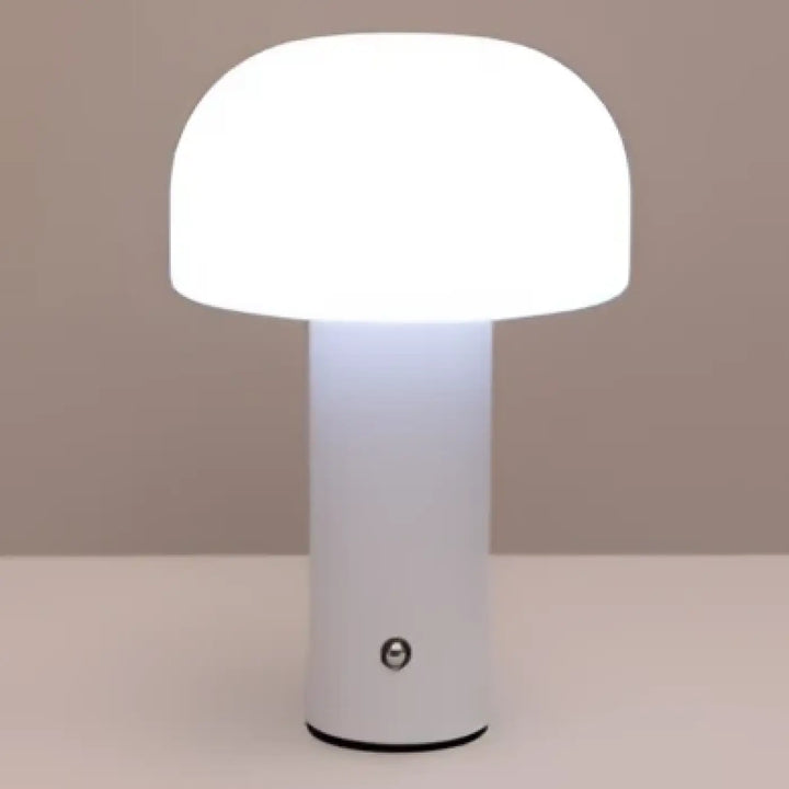 Lampe de table blanche design champignon avec base cylindrique lisse pour un intérieur moderne et minimaliste