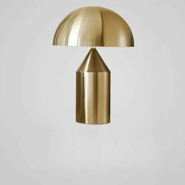 Lampe de table en laiton forme champignon avec finition polie et base géométrique idéale pour chambre à coucher