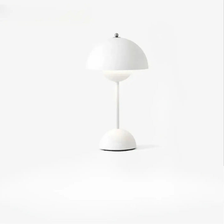 Lampe de table kopel en céramique blanche avec diffuseur sphérique lumineux au design minimaliste en forme de fleur ouverte