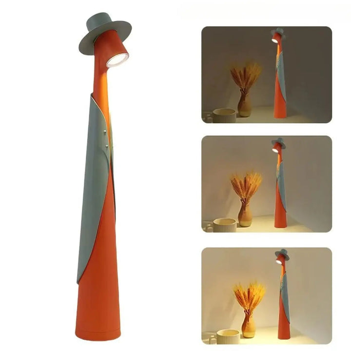 Lampe de table dandy orange et grise en métal brillant sculpturale représentant un homme au chapeau haut de forme