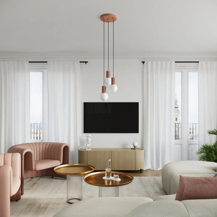 Lampe halo poser halo moka avec base circulaire cuivre et trois globes en verre laiteux blanc et rose mat