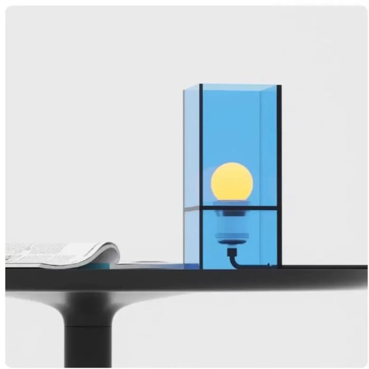 Lampe de table ZILOS translucide bleue avec ampoule jaune lumineuse et accents noirs au design minimaliste élégant
