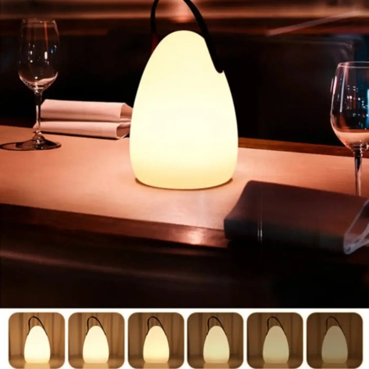 Lampe de table lumina en forme de poire avec poignée noire et finition mate pour décoration intérieure élégante