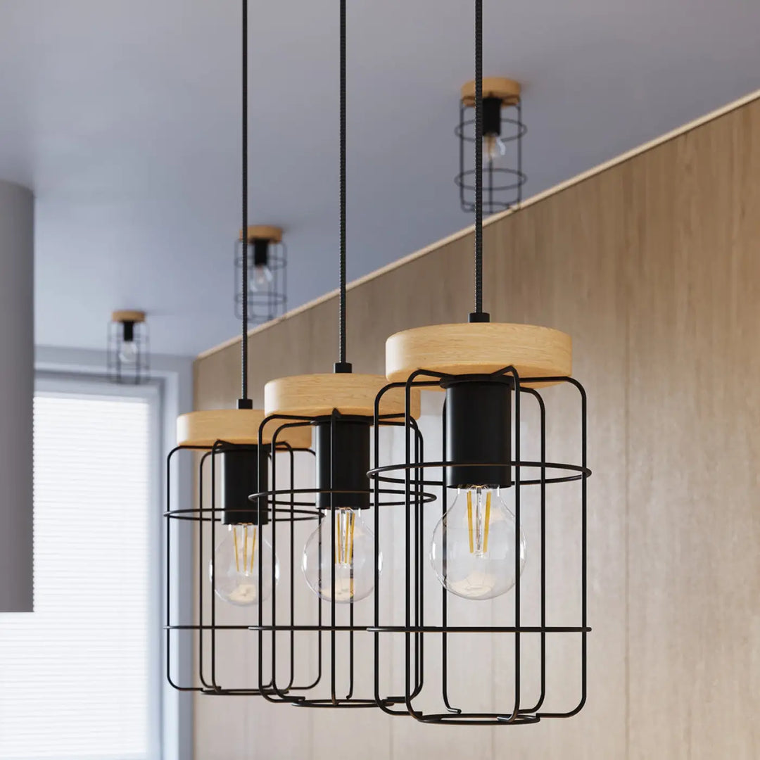 Lampe de table série gotto avec suspension cage noire, accents bois naturel et ampoules filament style loft