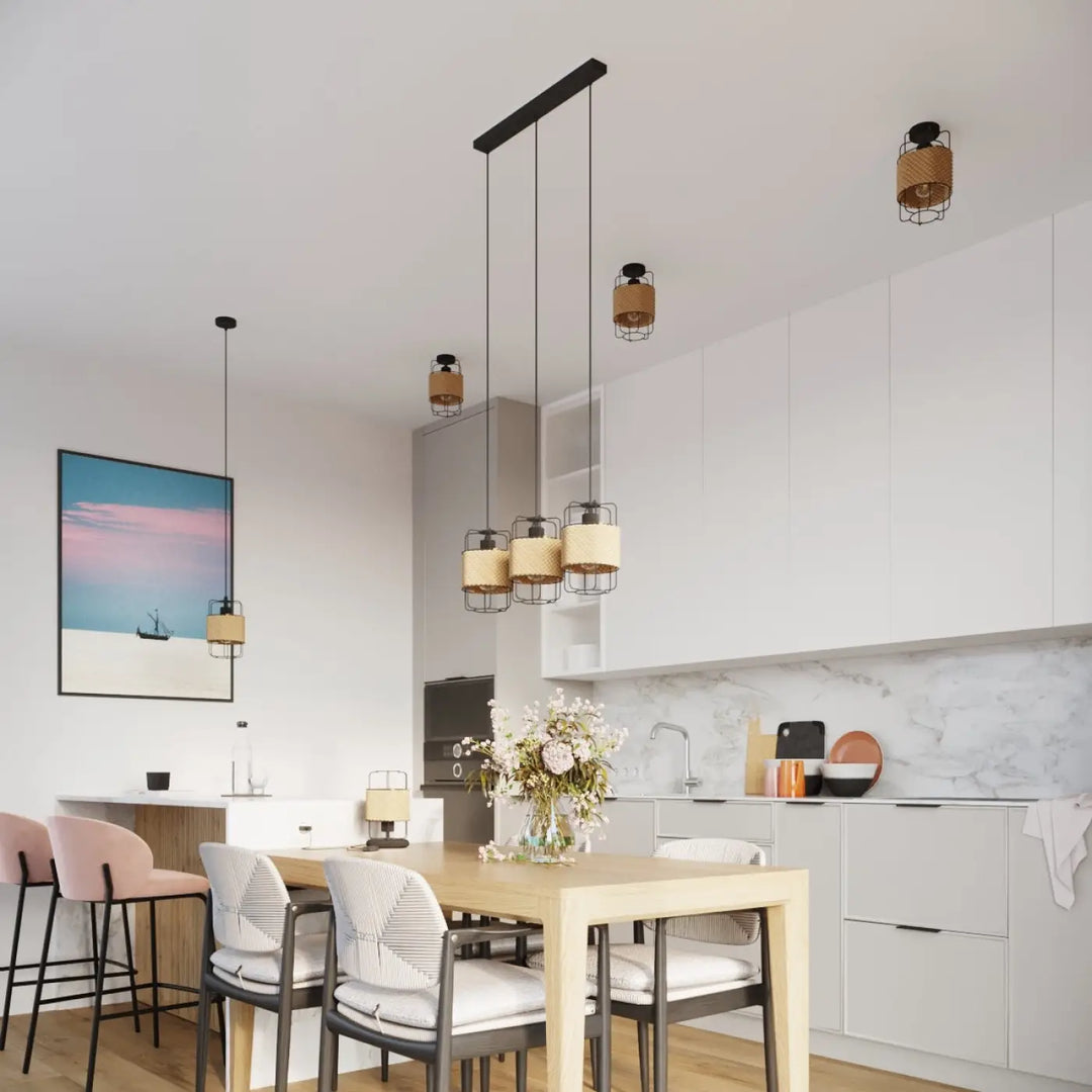 Lampe a poser série gizur style loft avec abat-jour tissé beige et cadre métallique noir au-dessus de la table à manger