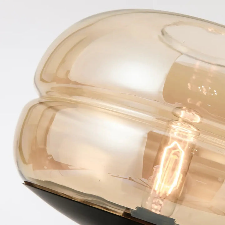 Lampe de table grisa en verre fumé ambré avec design minimaliste et ampoule à filament pour un cadeau original