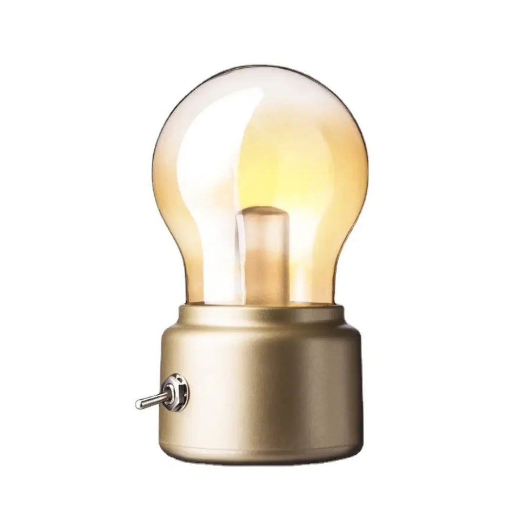 Lampe de table vintora avec cloche ambrée en led vintage et base dorée brossée pour décoration intérieure élégante