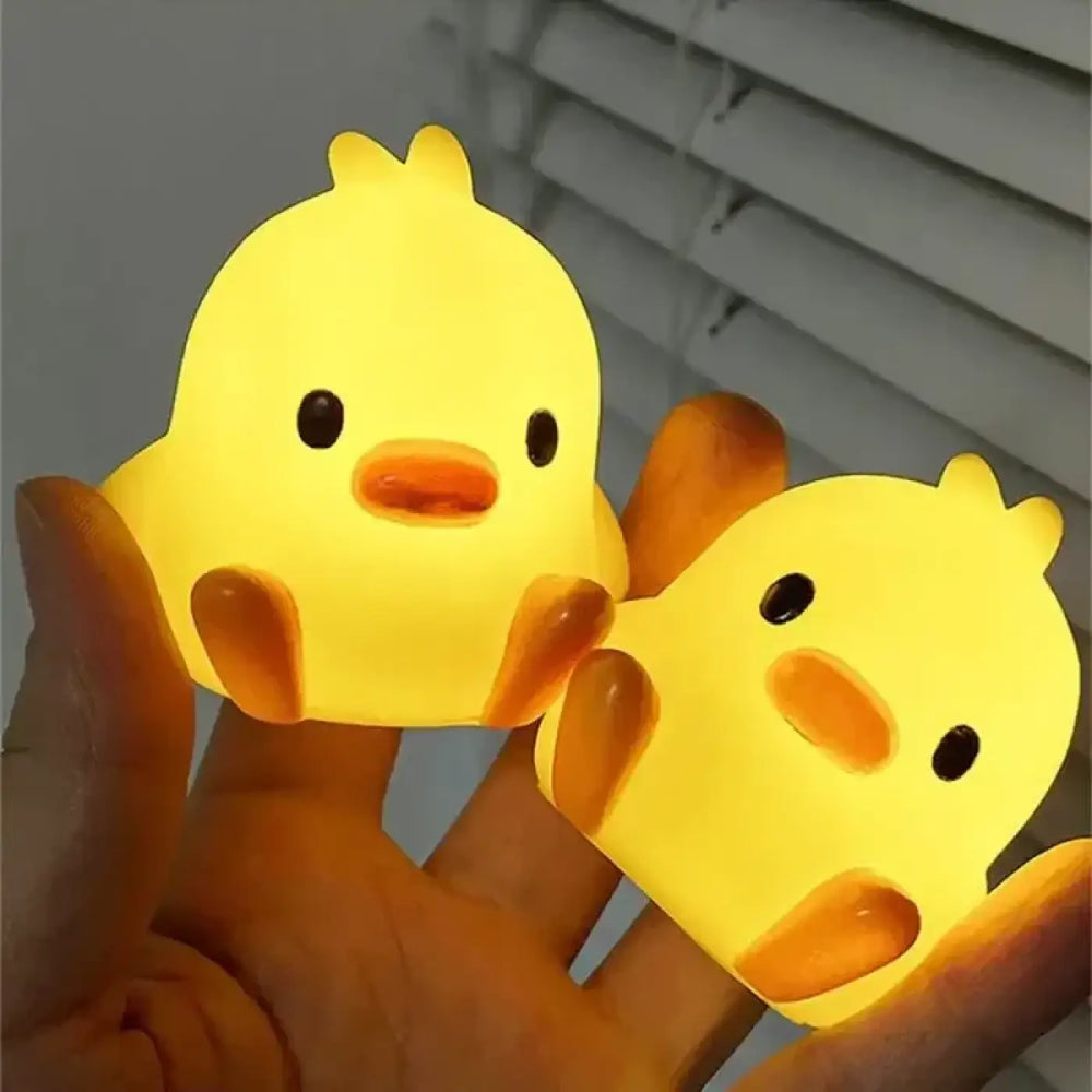 Veilleuse canard jaune toumy deux veilleuses canard de nuit avec bouton pile intégré et lumière jaune douce