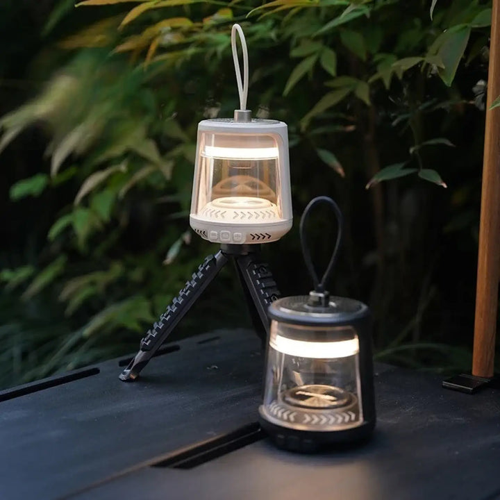 Lanterne led portable vago design moderne blanc et noir avec corps en verre clair et pied trépied pour luminaire extérieur