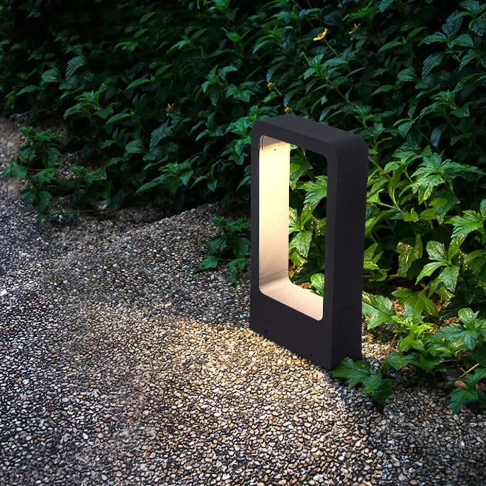 Luminaire extérieur contemporain kyro noir rectangulaire avec intérieur lumineux chaud pour éclairage extérieur contemporain