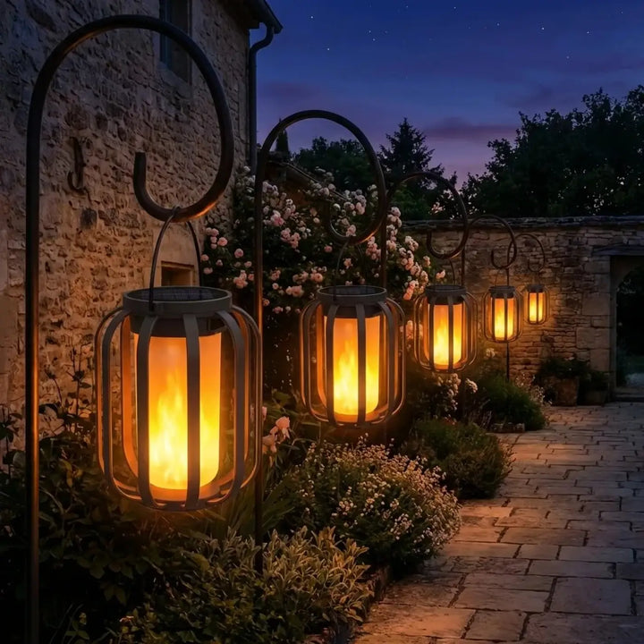 Black wrought iron luminaire extérieur solaire solva with warm orange effet flamme lighting design