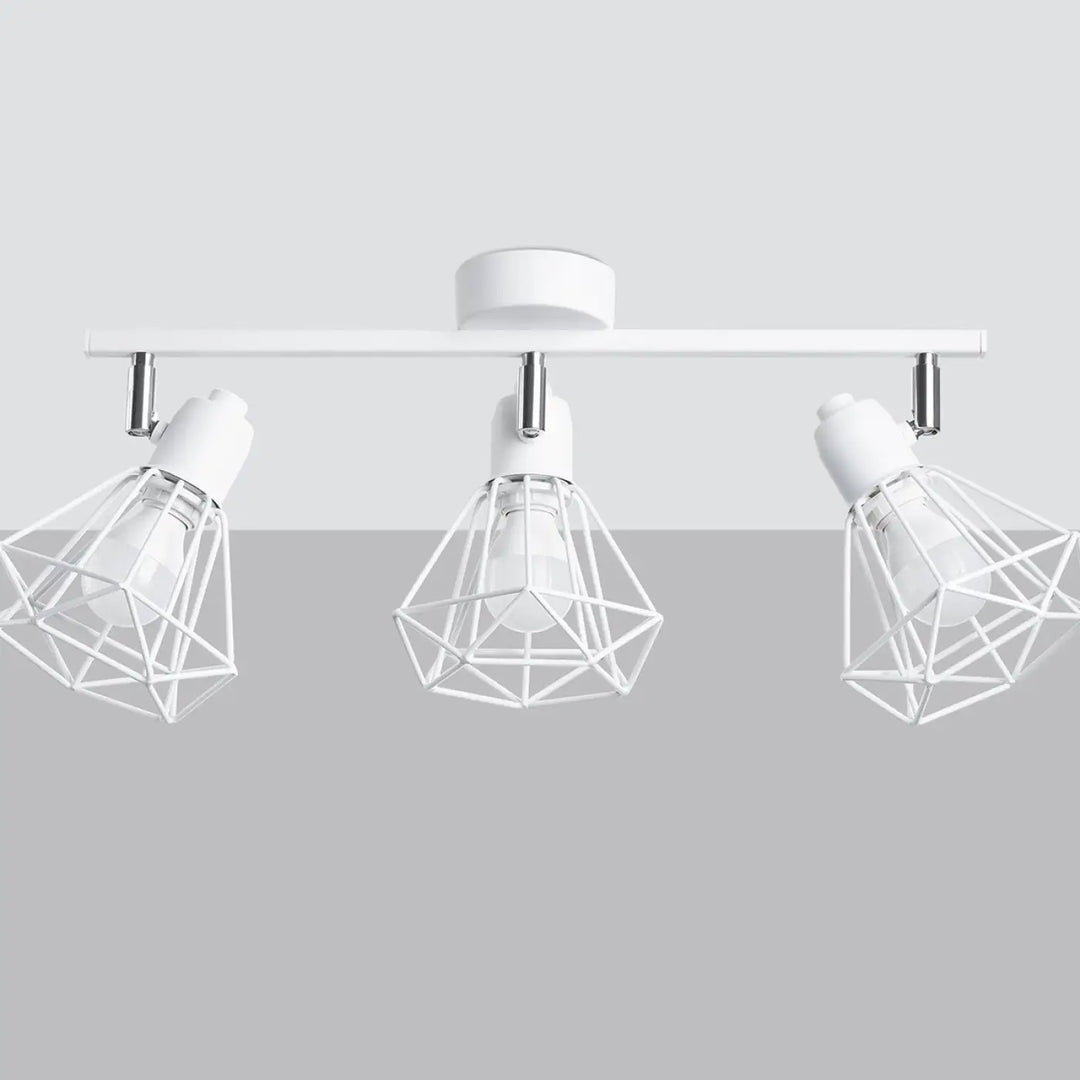 Luminaire plafonnier série artemis blanc avec trois spots ajustables créant une atmosphère intime raffinée