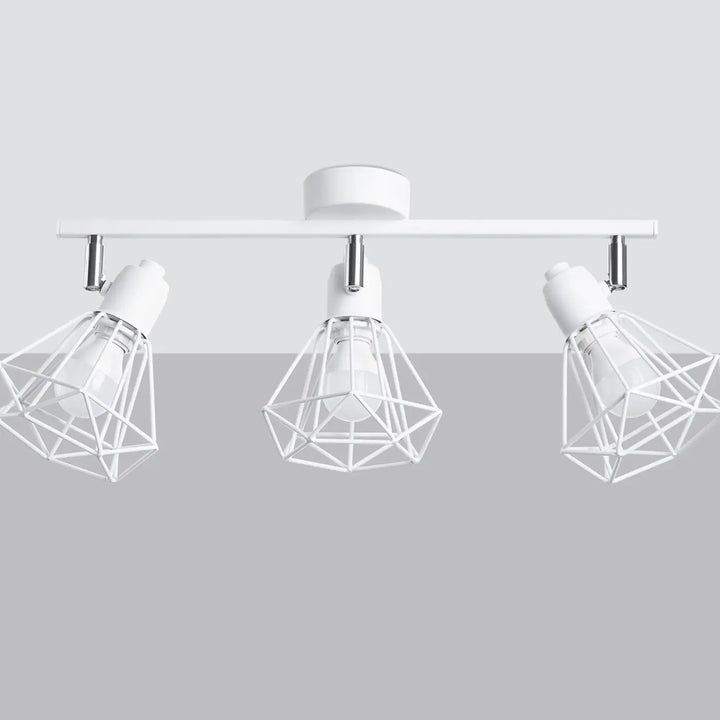 Luminaire plafonnier série artemis blanc avec trois spots ajustables créant une atmosphère intime raffinée
