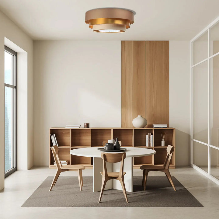 Luminaire plafonnier beige moderne à deux niveaux en finition laiton chaud avec design circulaire élégant triniti