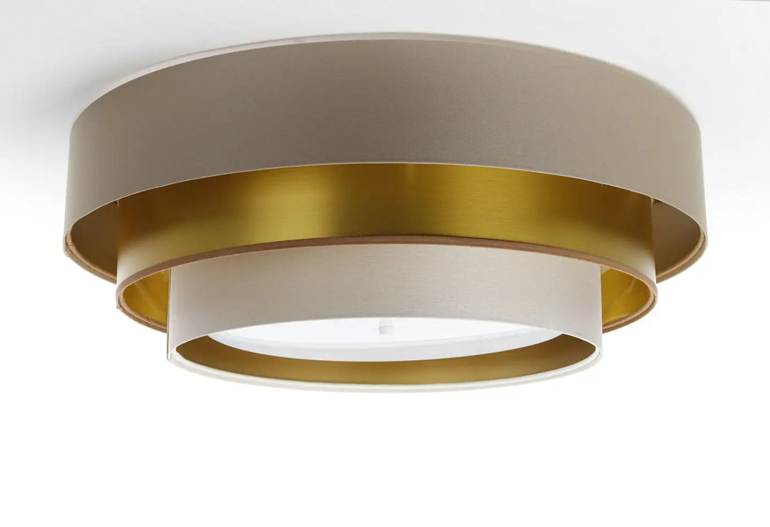 Luminaire plafonnier triniti elegant en métal beige mat et doré brossé avec design minimaliste concentrique