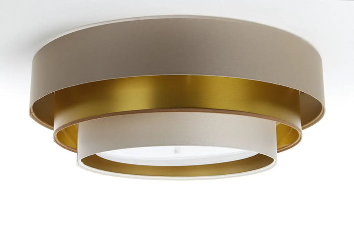 Luminaire plafonnier triniti elegant en métal beige mat et doré brossé avec design minimaliste concentrique
