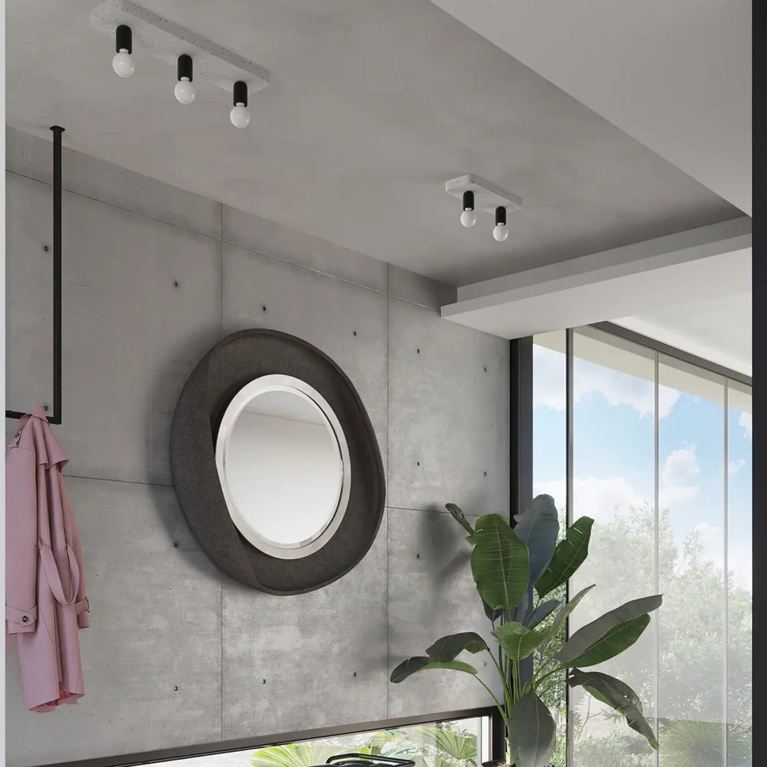 Plafonnier tavo 2 gris béton avec cadre en béton texturé sombre et bord argenté pour une esthétique moderne unique